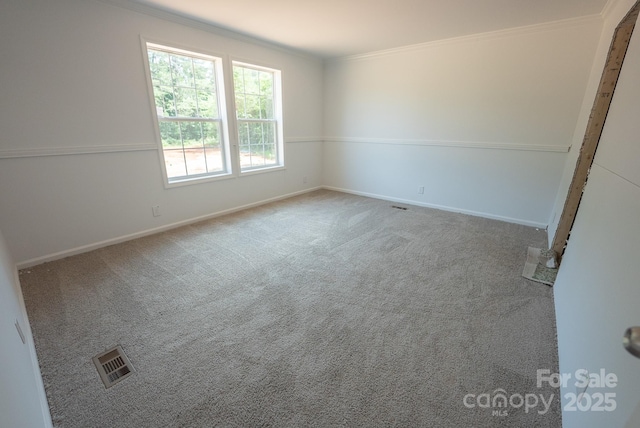 1853 Hill River Rd Unit 1, Hiddenite, NC 28636 - unfurnished room with crown molding and carpet flooring
