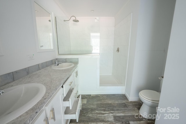 1853 Hill River Rd Unit 1, Hiddenite, NC 28636 - full bathroom featuring double vanity, walk in shower, wood finished floors, and ornamental molding