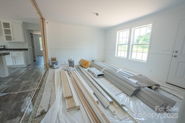1853 Hill River Rd Unit 1, Hiddenite, NC 28636 - unfurnished living room with wood finished floors and crown molding