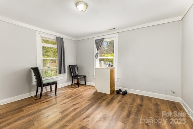 822 Cantwell St, Charlotte, NC 28208 - unfurnished room with plenty of natural light and wood finished floors