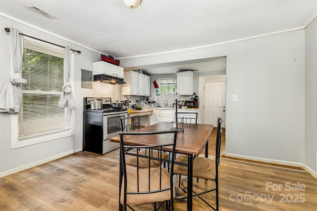 822 Cantwell St, Charlotte, NC 28208 - dining room with light wood-style flooring