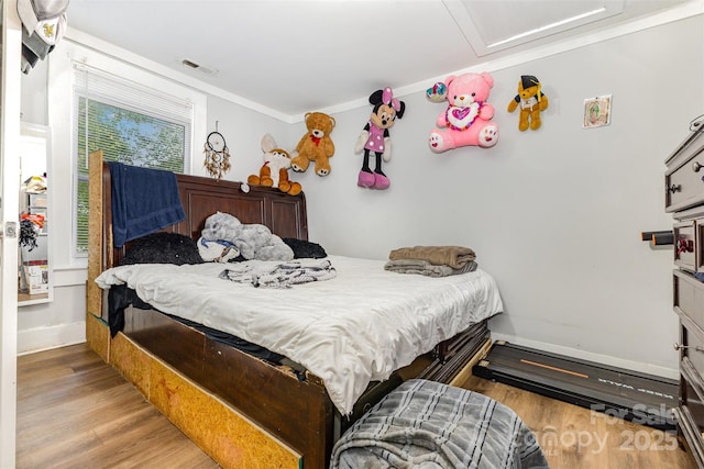822 Cantwell St, Charlotte, NC 28208 - bedroom with wood finished floors and attic access