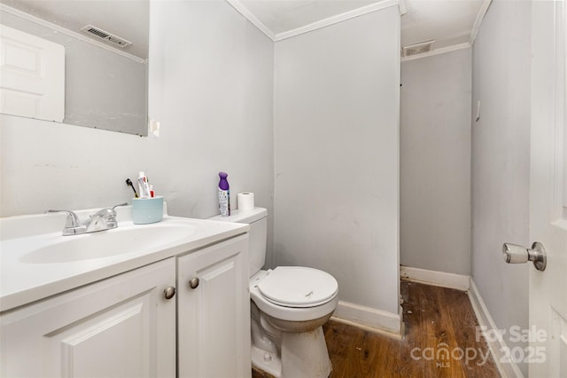 822 Cantwell St, Charlotte, NC 28208 - bathroom with crown molding, wood finished floors, and vanity