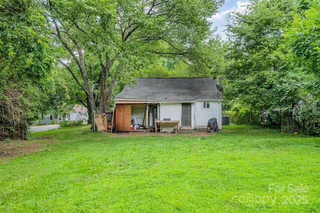 822 Cantwell St, Charlotte, NC 28208 - back of property featuring a shingled roof