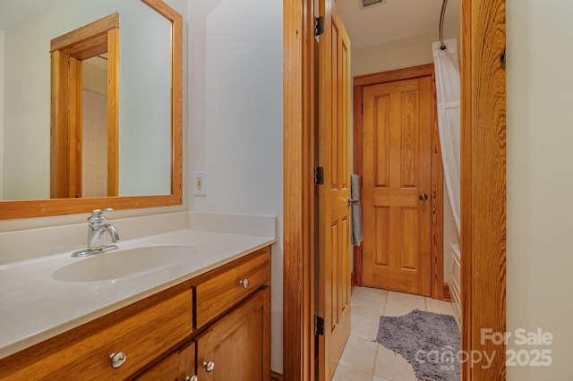 177 Yadkin Falls Rd, New London, NC 28127 - bathroom featuring vanity and tile patterned flooring