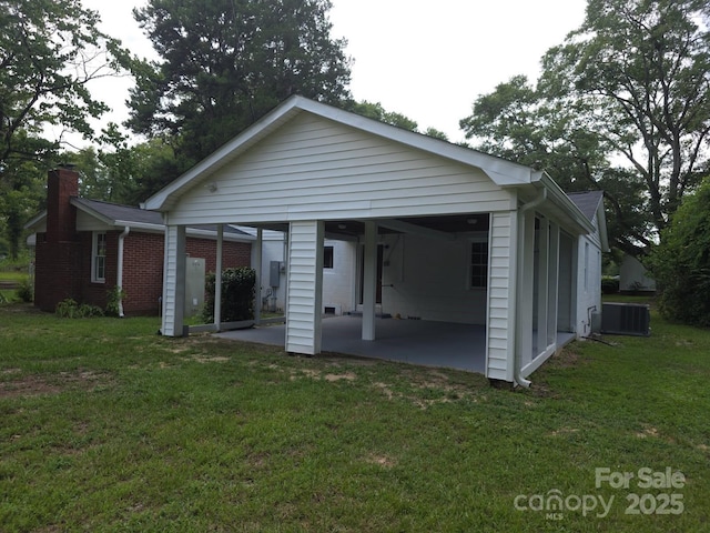6820 Butterfly Ln, Kershaw, SC 29067 - back of property with a yard and a patio