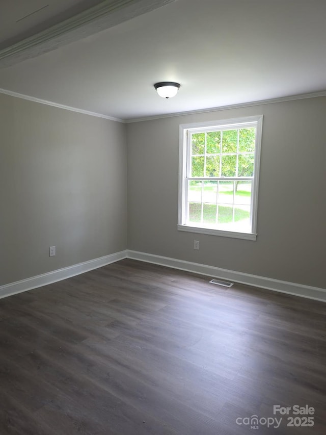6820 Butterfly Ln, Kershaw, SC 29067 - unfurnished room with ornamental molding and dark wood-type flooring