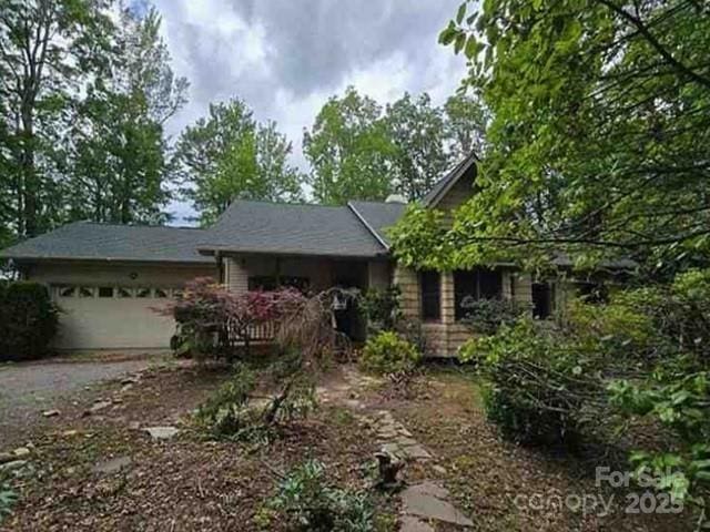 300 Serenity Trl, Rosman, NC 28772 - ranch-style house with driveway and a garage