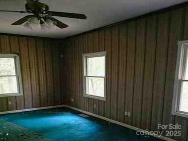 300 Serenity Trl, Rosman, NC 28772 - empty room featuring ceiling fan and wood walls