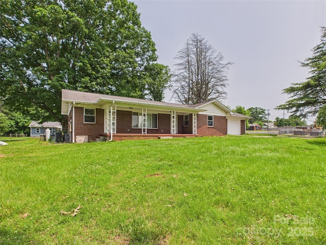 61 23rd St NW, Hickory, NC 28601 - single story home featuring brick siding, a front yard, a garage, and a porch