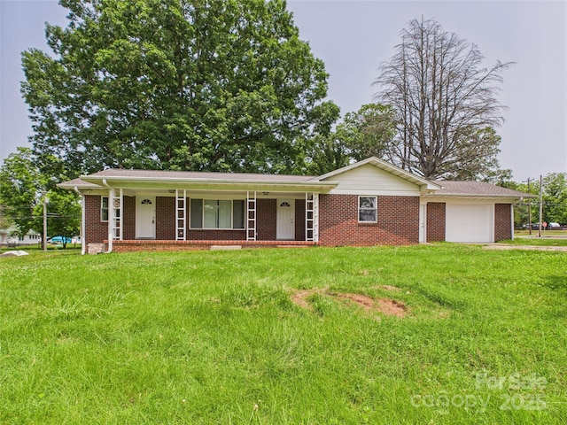 61 23rd St NW, Hickory, NC 28601 - single story home featuring an attached garage, brick siding, a porch, and a front lawn