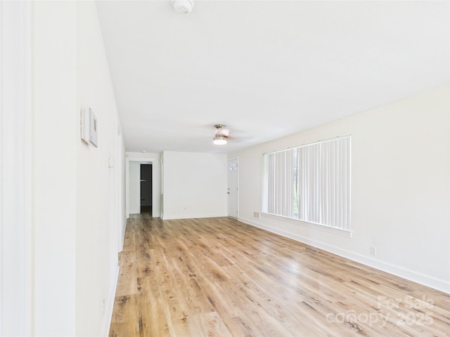 61 23rd St NW, Hickory, NC 28601 - empty room with a smoke detector and light wood-type flooring