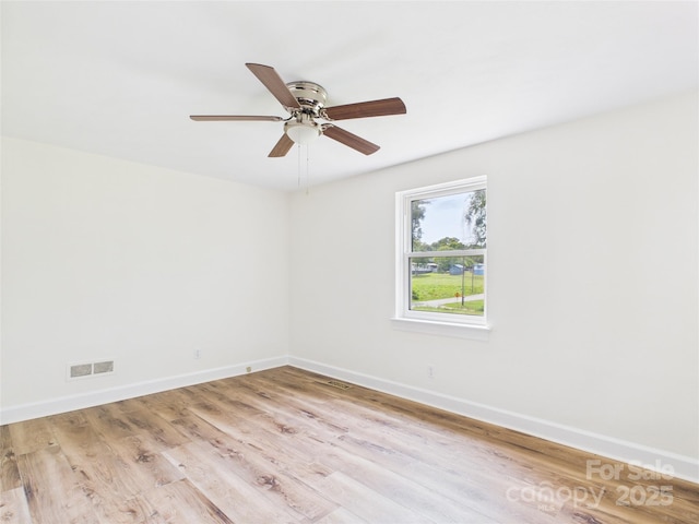 61 23rd St NW, Hickory, NC 28601 - spare room with ceiling fan and wood finished floors