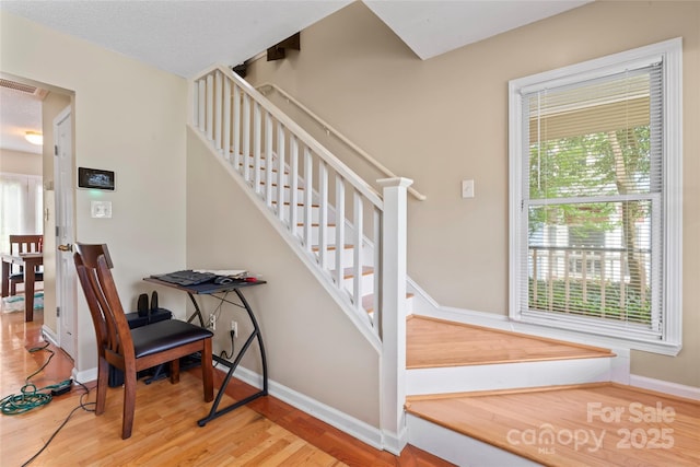 1609 Begonia Way, Rock Hill, SC 29732 - staircase featuring wood finished floors and baseboards