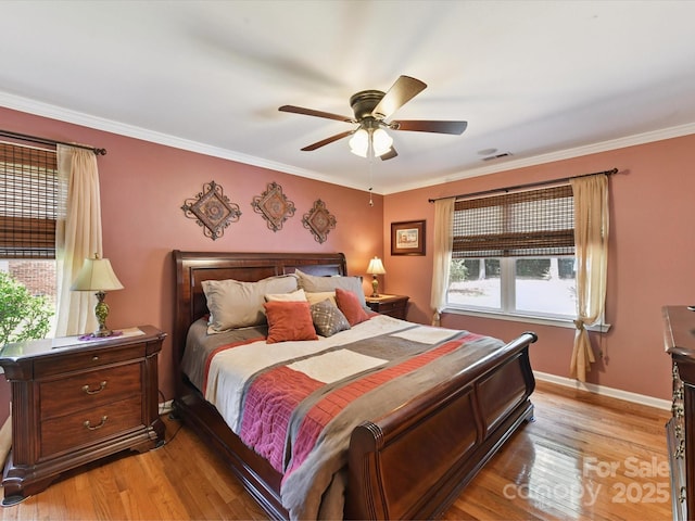 7139 Powder Mill Pl, Charlotte, NC 28277 - bedroom with light wood-style flooring, crown molding, and ceiling fan