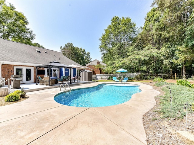 7139 Powder Mill Pl, Charlotte, NC 28277 - view of pool with a gazebo, a storage shed, a fenced backyard, a patio area, and area for grilling