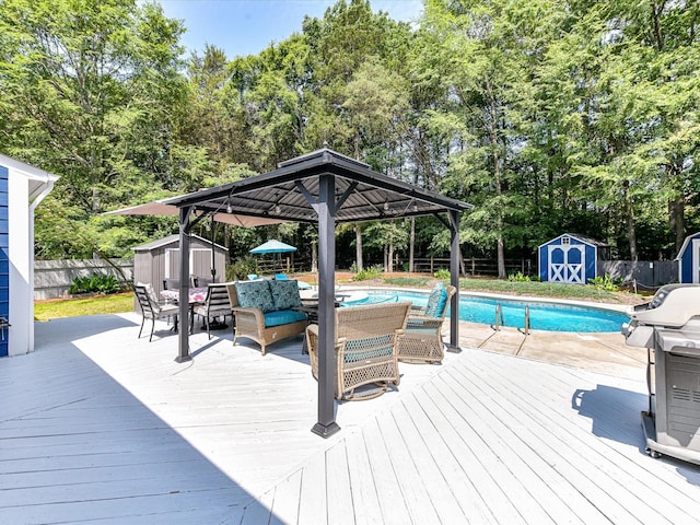 7139 Powder Mill Pl, Charlotte, NC 28277 - wooden deck featuring a storage shed, a gazebo, an outdoor living space, and view of scattered trees