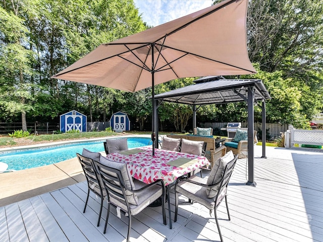 7139 Powder Mill Pl, Charlotte, NC 28277 - deck featuring a storage unit, a gazebo, a fenced backyard, an outdoor hangout area, and outdoor dining space