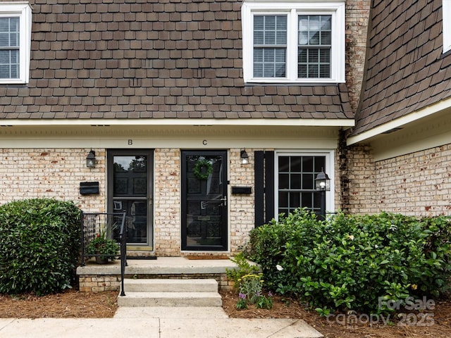 1708 Roxborough Rd Unit C, Charlotte, NC 28211 - view of exterior entry featuring brick siding