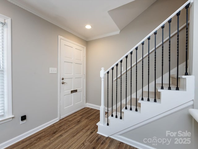 1708 Roxborough Rd Unit C, Charlotte, NC 28211 - entrance foyer featuring wood finished floors, ornamental molding, recessed lighting, and stairs