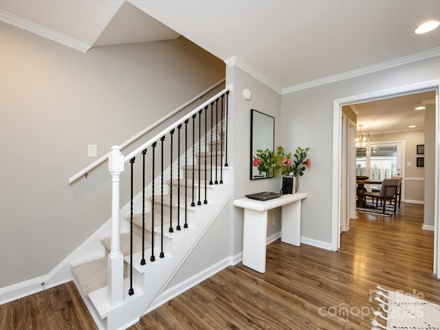 1708 Roxborough Rd Unit C, Charlotte, NC 28211 - stairs featuring wood finished floors, crown molding, and a chandelier