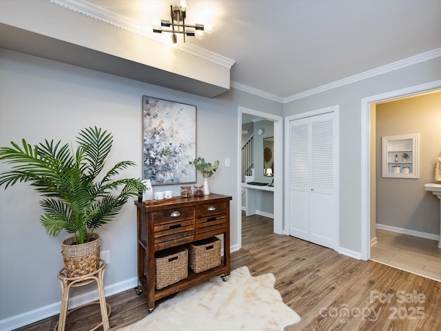 1708 Roxborough Rd Unit C, Charlotte, NC 28211 - interior space with a chandelier, wood finished floors, and crown molding