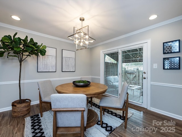 1708 Roxborough Rd Unit C, Charlotte, NC 28211 - dining room featuring a chandelier, wood finished floors, ornamental molding, and recessed lighting