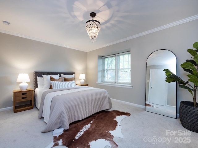 1708 Roxborough Rd Unit C, Charlotte, NC 28211 - bedroom featuring crown molding, carpet, and a chandelier
