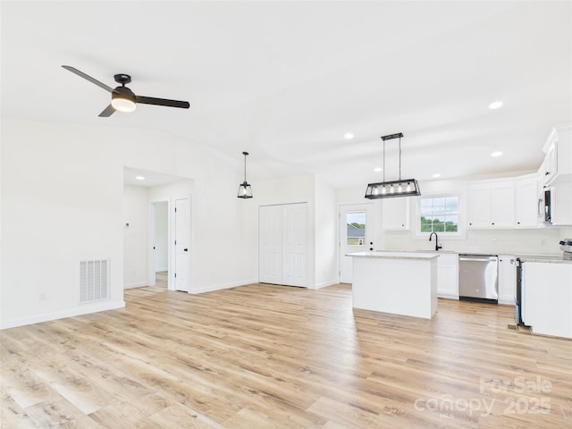3016 Icard Rhodhiss Rd, Connelly Springs, NC 28612 - unfurnished living room featuring light wood-type flooring, lofted ceiling, a ceiling fan, and recessed lighting