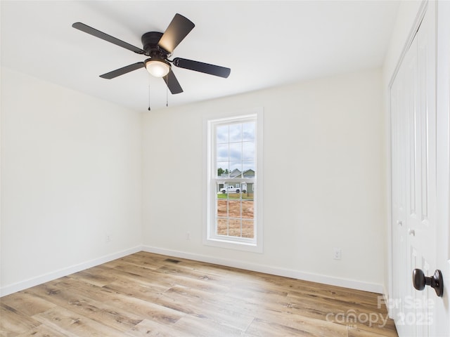 3016 Icard Rhodhiss Rd, Connelly Springs, NC 28612 - unfurnished bedroom with a closet, light wood finished floors, and ceiling fan