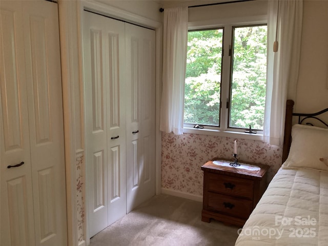 31 Rhododendron Rd, Black Mountain, NC 28711 - bedroom featuring multiple windows, light carpet, and wallpapered walls