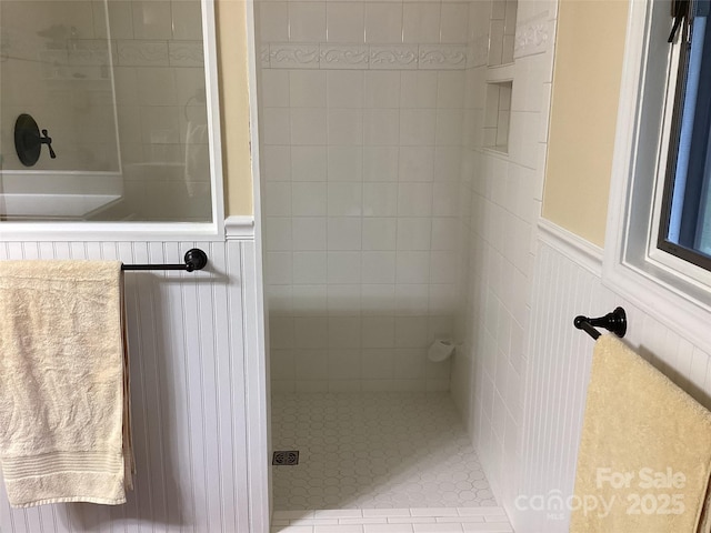 31 Rhododendron Rd, Black Mountain, NC 28711 - full bath with tiled shower and a wainscoted wall