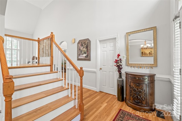 1069 Westlake Dr, Kannapolis, NC 28081 - staircase featuring wood finished floors and high vaulted ceiling