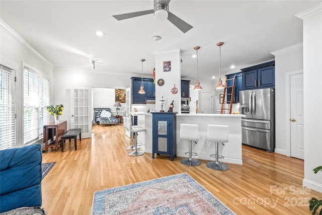 1069 Westlake Dr, Kannapolis, NC 28081 - living room with ornamental molding, ceiling fan, light wood-style floors, and recessed lighting