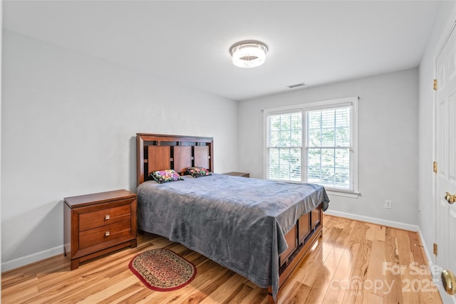 1069 Westlake Dr, Kannapolis, NC 28081 - bedroom featuring light wood-type flooring and baseboards