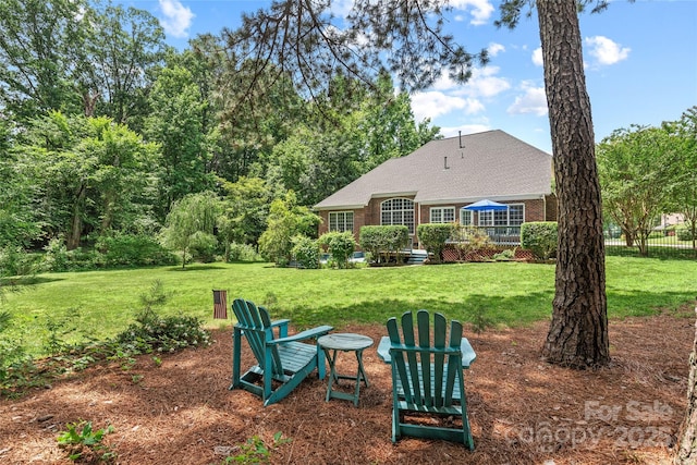 1069 Westlake Dr, Kannapolis, NC 28081 - back of property featuring brick siding, a shingled roof, and a deck