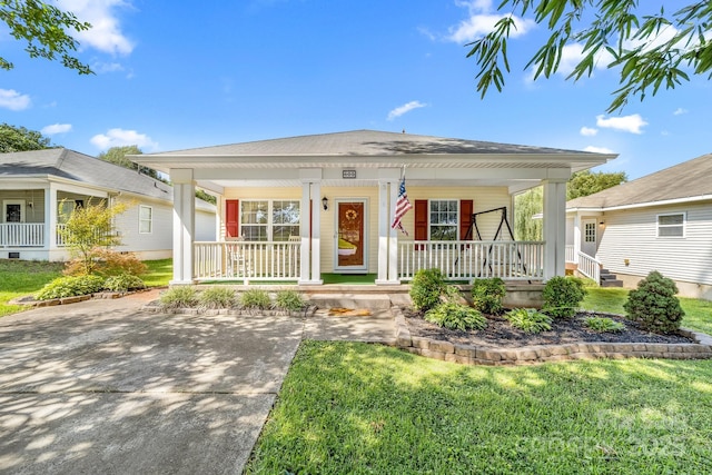 611 Church St, Belmont, NC 28012 - view of front facade with covered porch and a front lawn