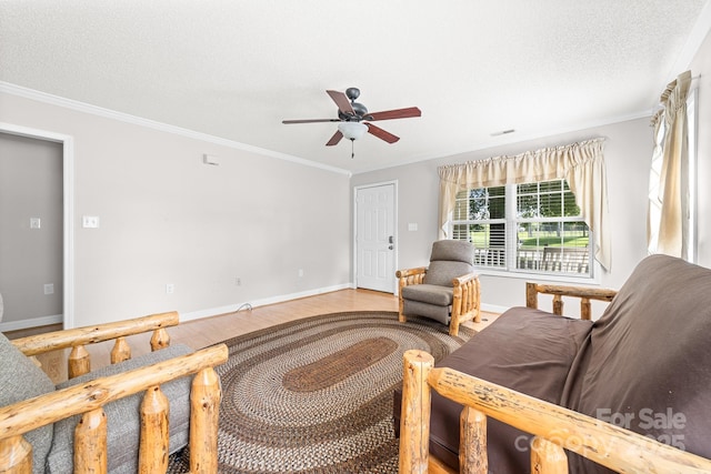 611 Church St, Belmont, NC 28012 - living area with ceiling fan, crown molding, wood finished floors, and a textured ceiling