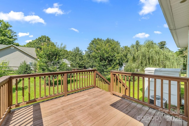 611 Church St, Belmont, NC 28012 - wooden terrace featuring a lawn and a storage unit