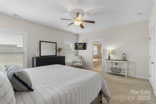 11806 Stirling Field Dr, Pineville, NC 28134 - bedroom featuring carpet floors, ensuite bathroom, and a ceiling fan
