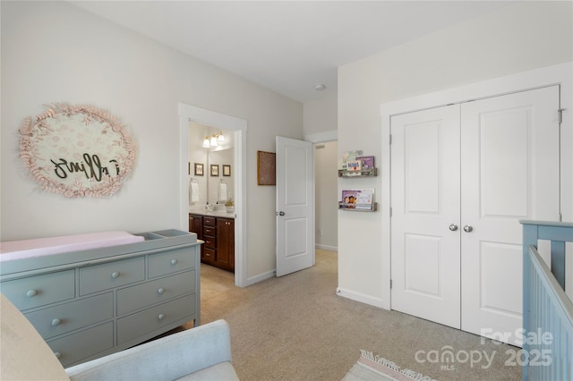 11806 Stirling Field Dr, Pineville, NC 28134 - bedroom featuring light carpet, a closet, and ensuite bathroom