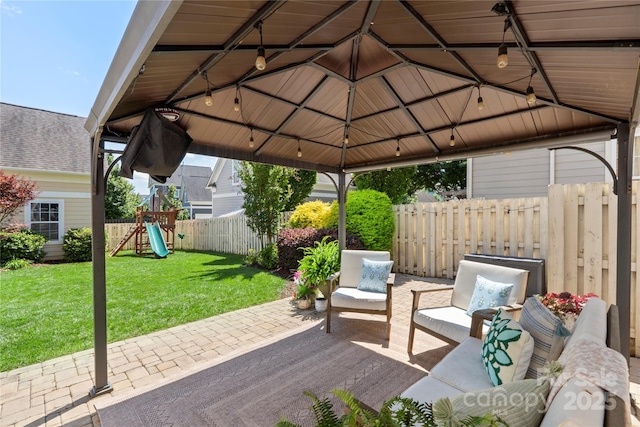 11806 Stirling Field Dr, Pineville, NC 28134 - fenced backyard featuring a gazebo, a patio area, a playground, and outdoor lounge area