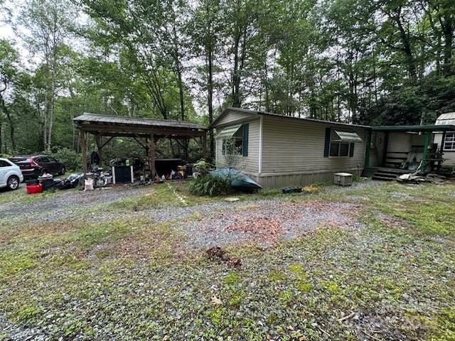 63 Apple Bee Rd, Brevard, NC 28712 - view of property exterior featuring a carport