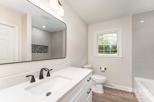 9410 Mountain Aire Cir, Charlotte, NC 28214 - full bathroom featuring wood finished floors and vanity