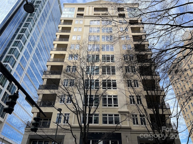 230 S Tryon St Unit 304, Charlotte, NC 28202 - view of apartment building / complex