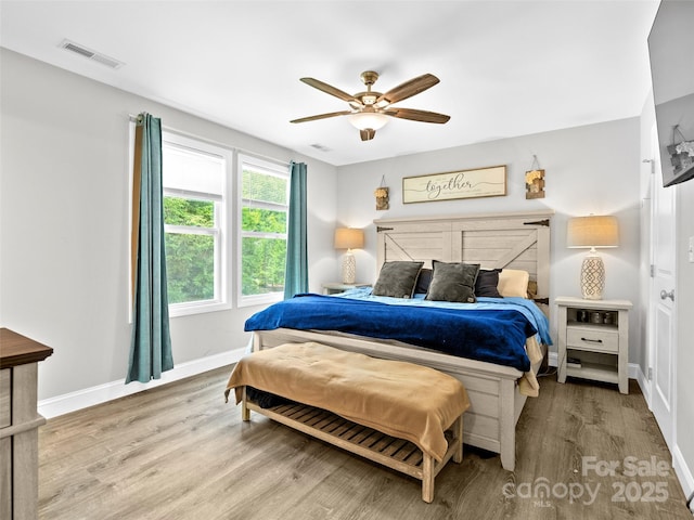 21 Brown Trout Trl, Candler, NC 28715 - bedroom featuring wood finished floors and a ceiling fan