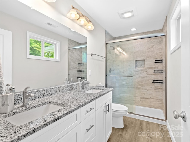 21 Brown Trout Trl, Candler, NC 28715 - full bathroom with wood finished floors, a stall shower, and double vanity