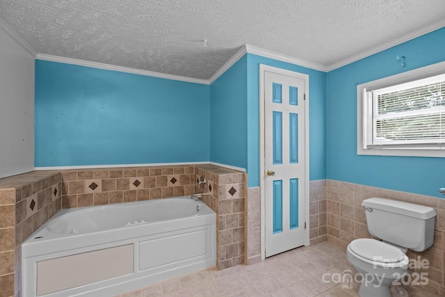 7011 S Providence Rd, Waxhaw, NC 28173 - full bathroom featuring tile walls, a garden tub, wainscoting, a textured ceiling, and tile patterned flooring