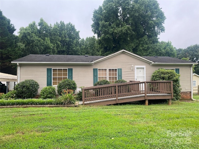 117 Haystack Ln, Olin, NC 28660 - rear view of house with a deck and a lawn