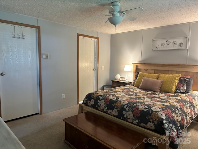 117 Haystack Ln, Olin, NC 28660 - bedroom with carpet flooring, a textured ceiling, and ceiling fan